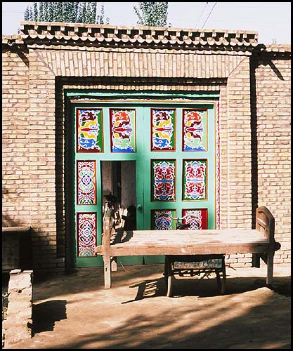 Residential Doorways<br>Kuqa :: Xinjiang, China: Kuqa, Xinjiang, People's Republic of China
: Buildings.