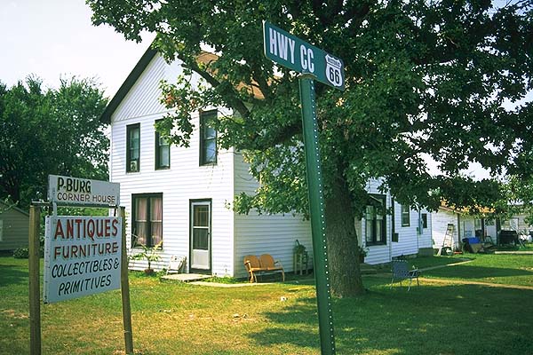 Rural antique dealer<br>South of Lebanon, Missouri: Missouri Route 66, Missouri, United States of America
: Signs; Buildings.