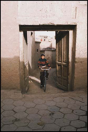 Cycling the side roads<br><br>Kashgar :: Xinjiang, China: Kashgar, Xinjiang, People's Republic of China
: People You Meet; City Scenes.