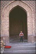 Boy in the Doorway ::  :: Kashgar :: Xinjiang, China