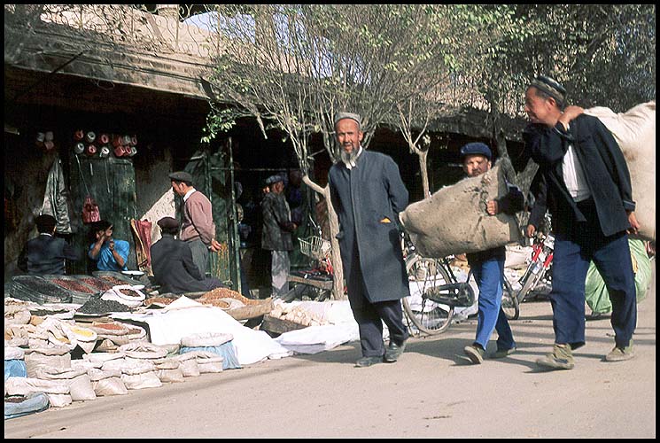 The Thursday Market<br>Kuqa :: Xinjiang, China: Kuqa, Xinjiang, People's Republic of China
: People You Meet; Food Stalls and Markets.