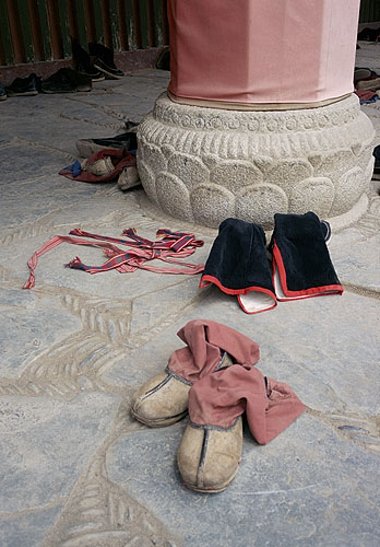 More boots.<p>Labrang Si, Xiahe<br>Gansu Province, China: Xiahe -- Labrang Si, Gansu, People's Republic of China
: Temples; Buildings.