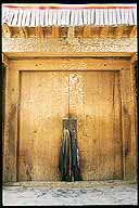 Doorway and prayer shawls.